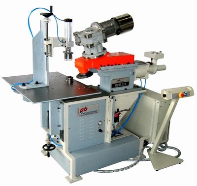 <b>RCM 34</b> - Trimming beading machine with motor driven blades